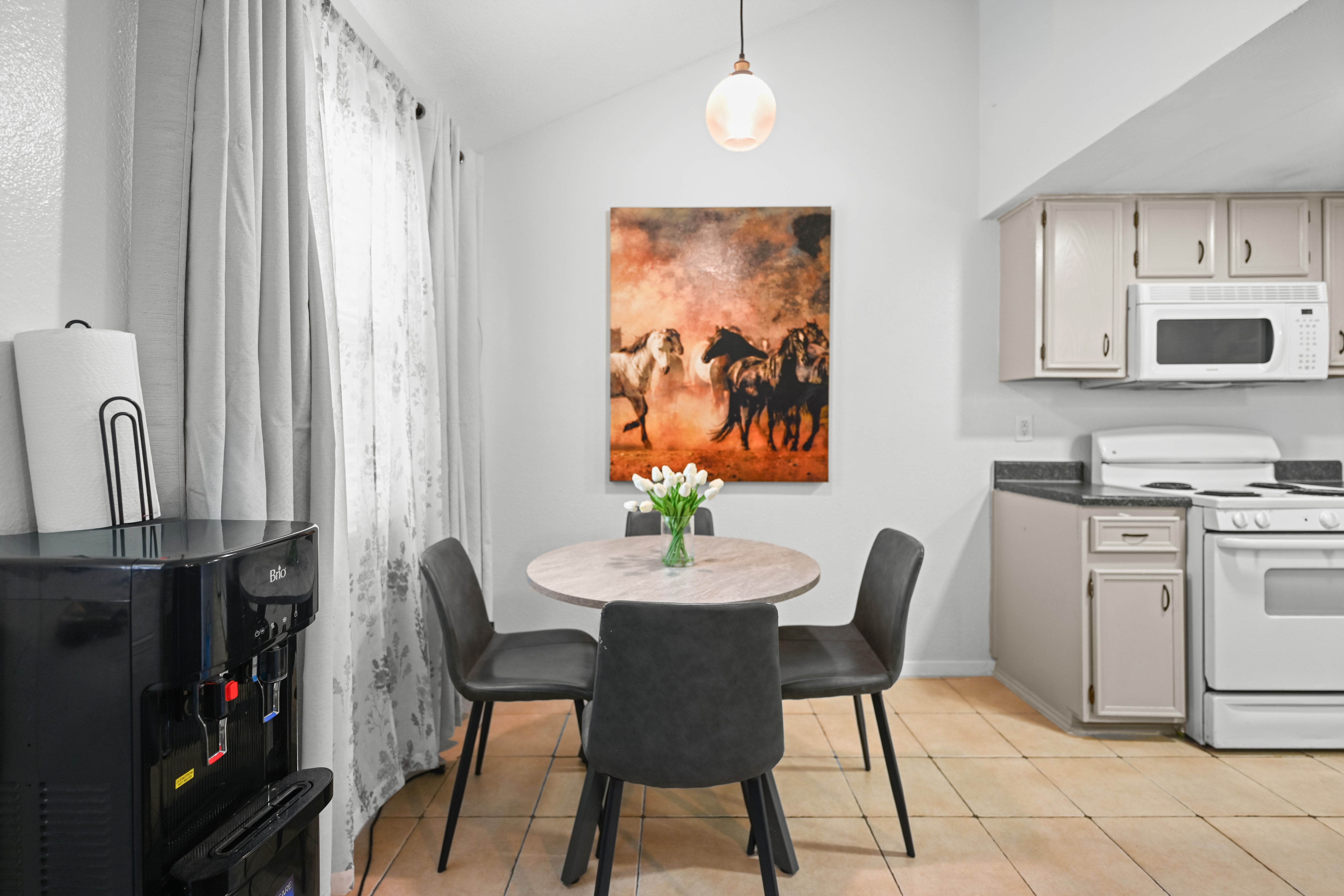 8710 Clearbrook Trail Austin, TX 78729 - Photo 20 of 28 a view of a dining room with furniture and a window