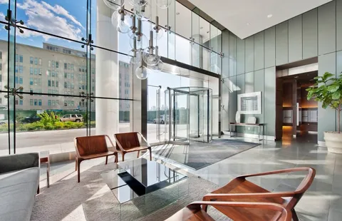 a outdoor space with patio the couches and a dining table with the view of the glass door