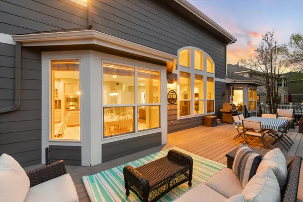 a view of an apartment with a large window and a yard