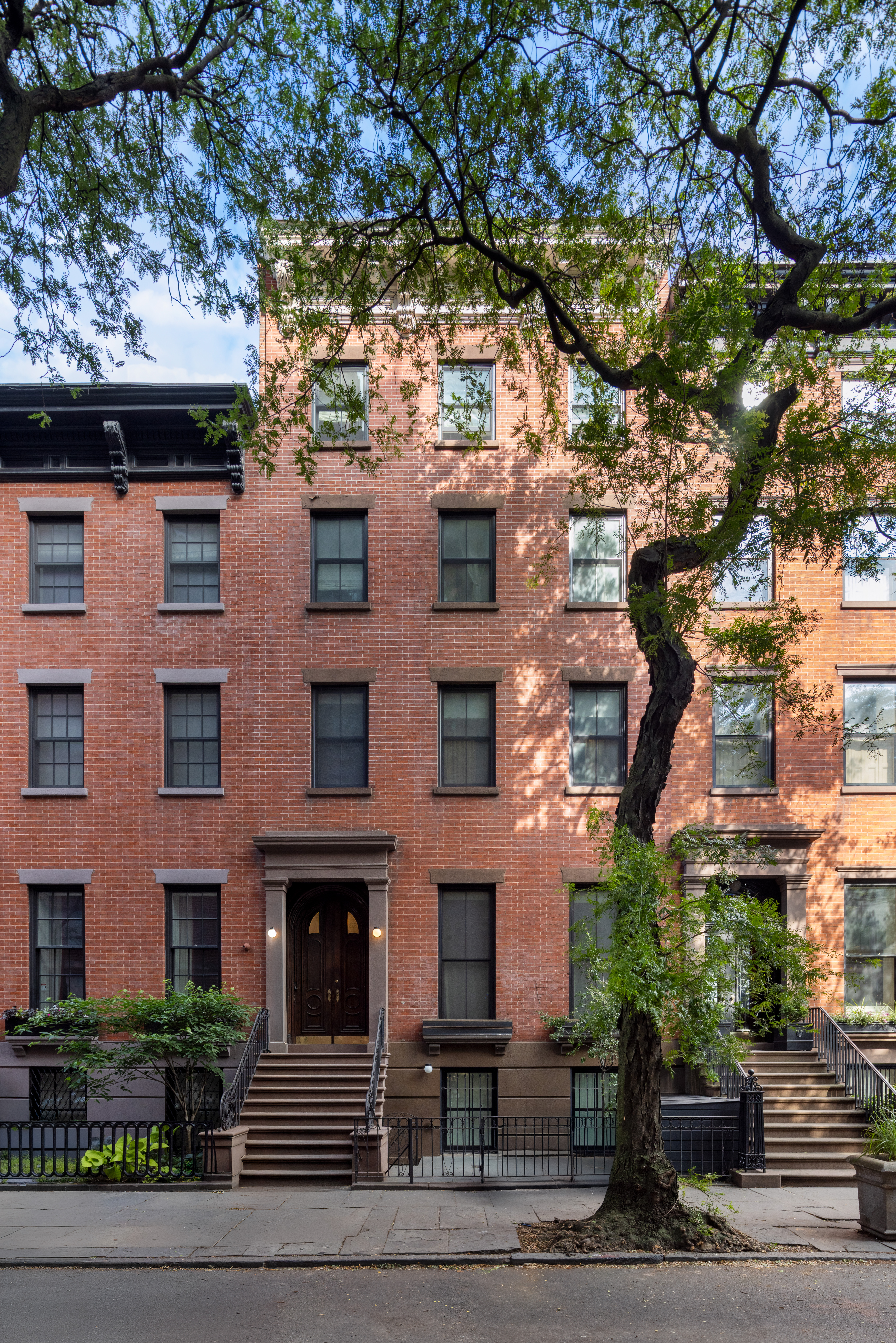 a front view of a building with balcony