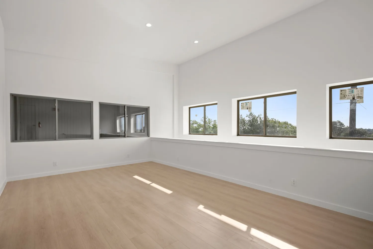 a view of an empty room with a window