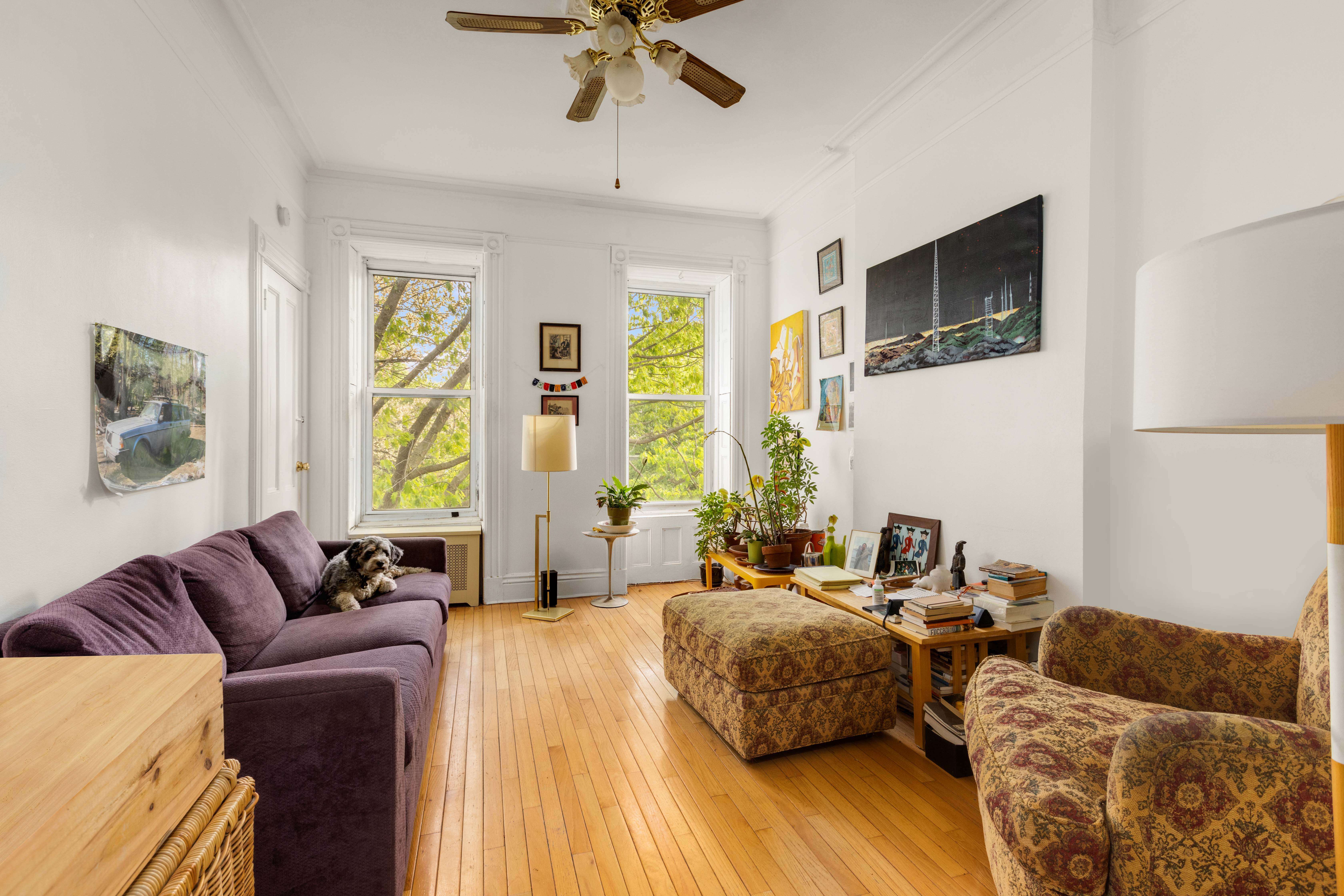 449 11th Street Brooklyn, NY 11215 - Photo 3 of 17 a spacious bedroom with a bed window and couch