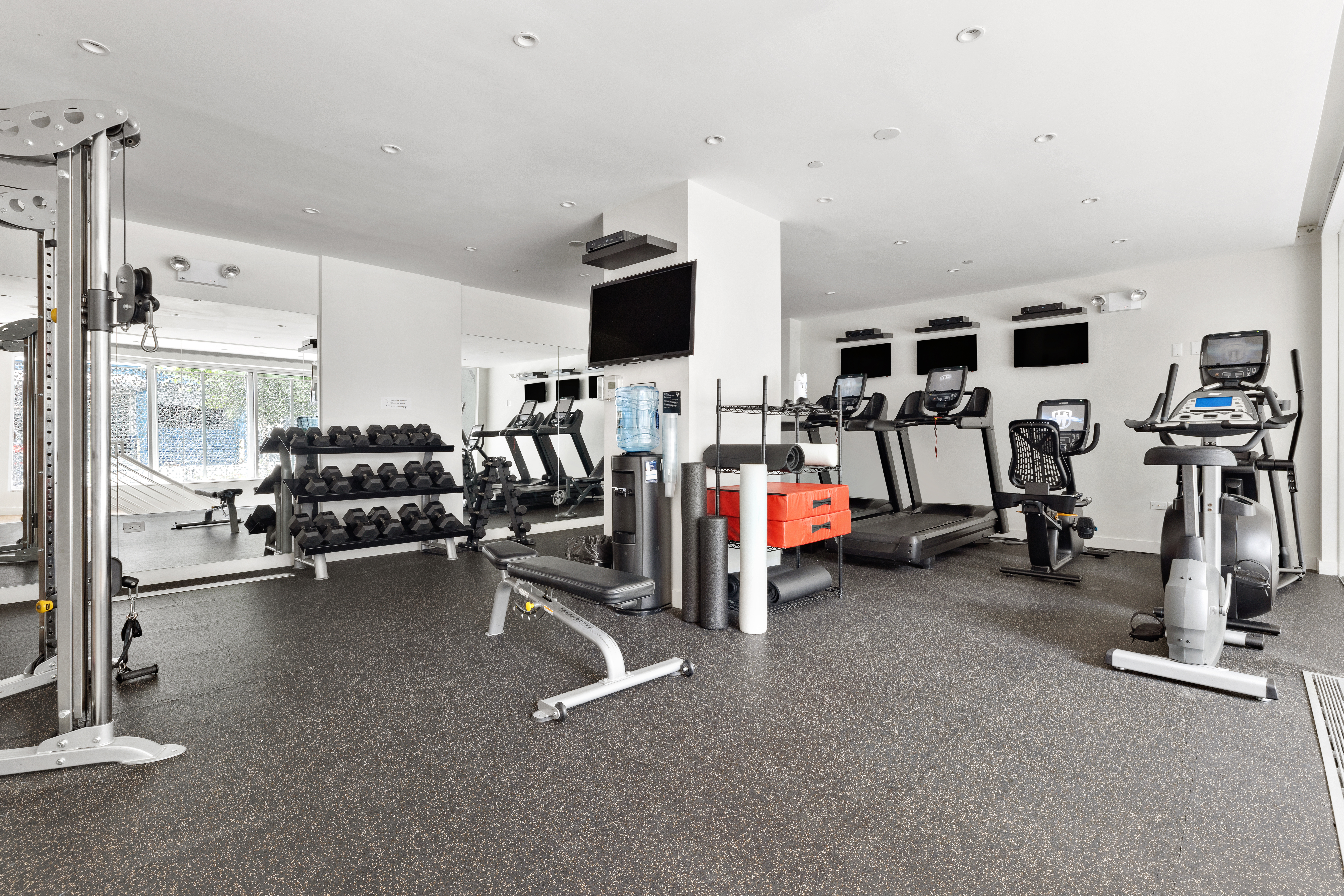 151 West 21st Street, Unit 9C Manhattan, NY 10011 - Photo 8 of 10 a view of a room with gym equipment