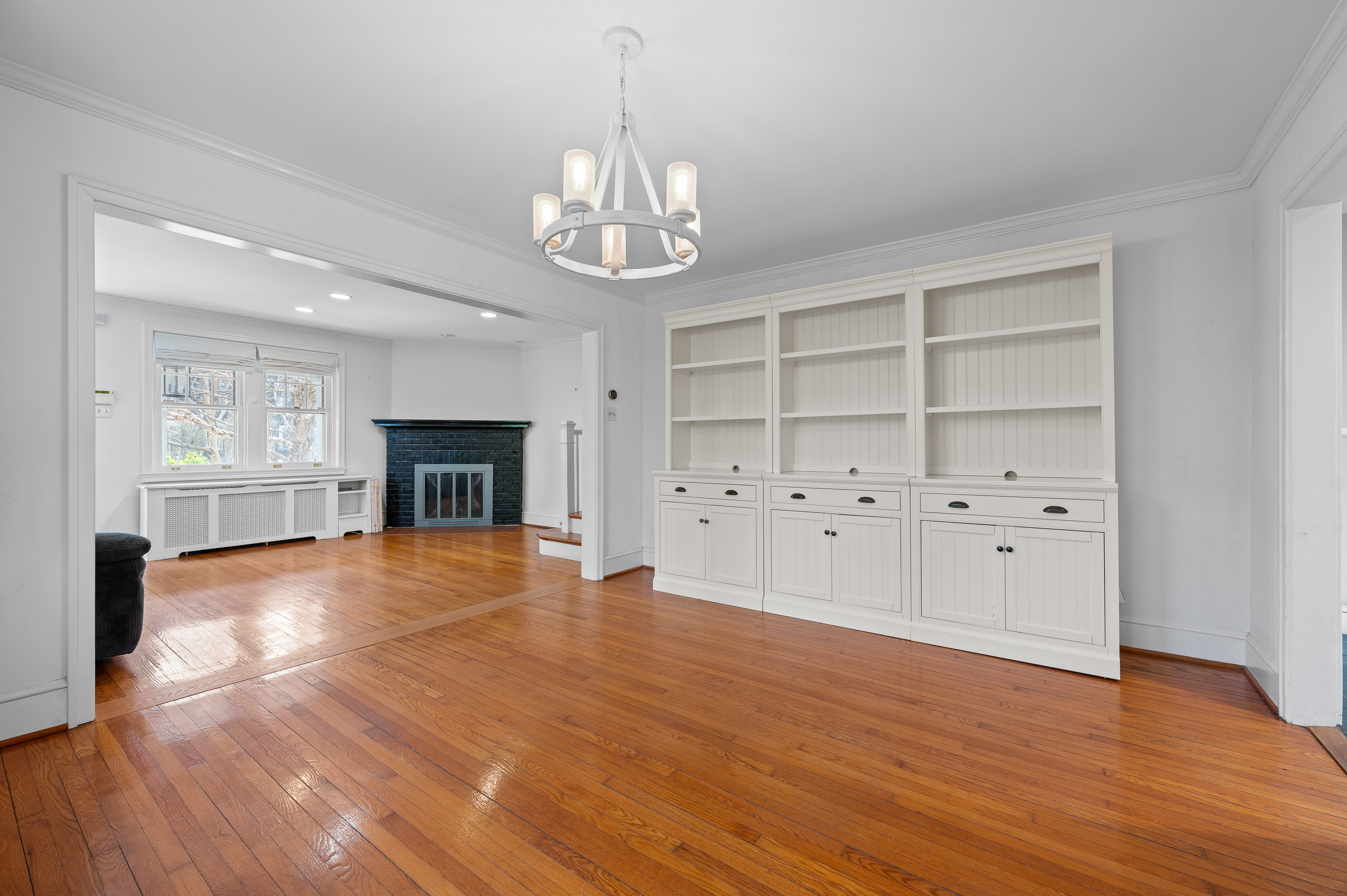 201 West Avenue Wayne, PA 19087 - Photo 8 of 26 wooden floor in an empty room with a fireplace
