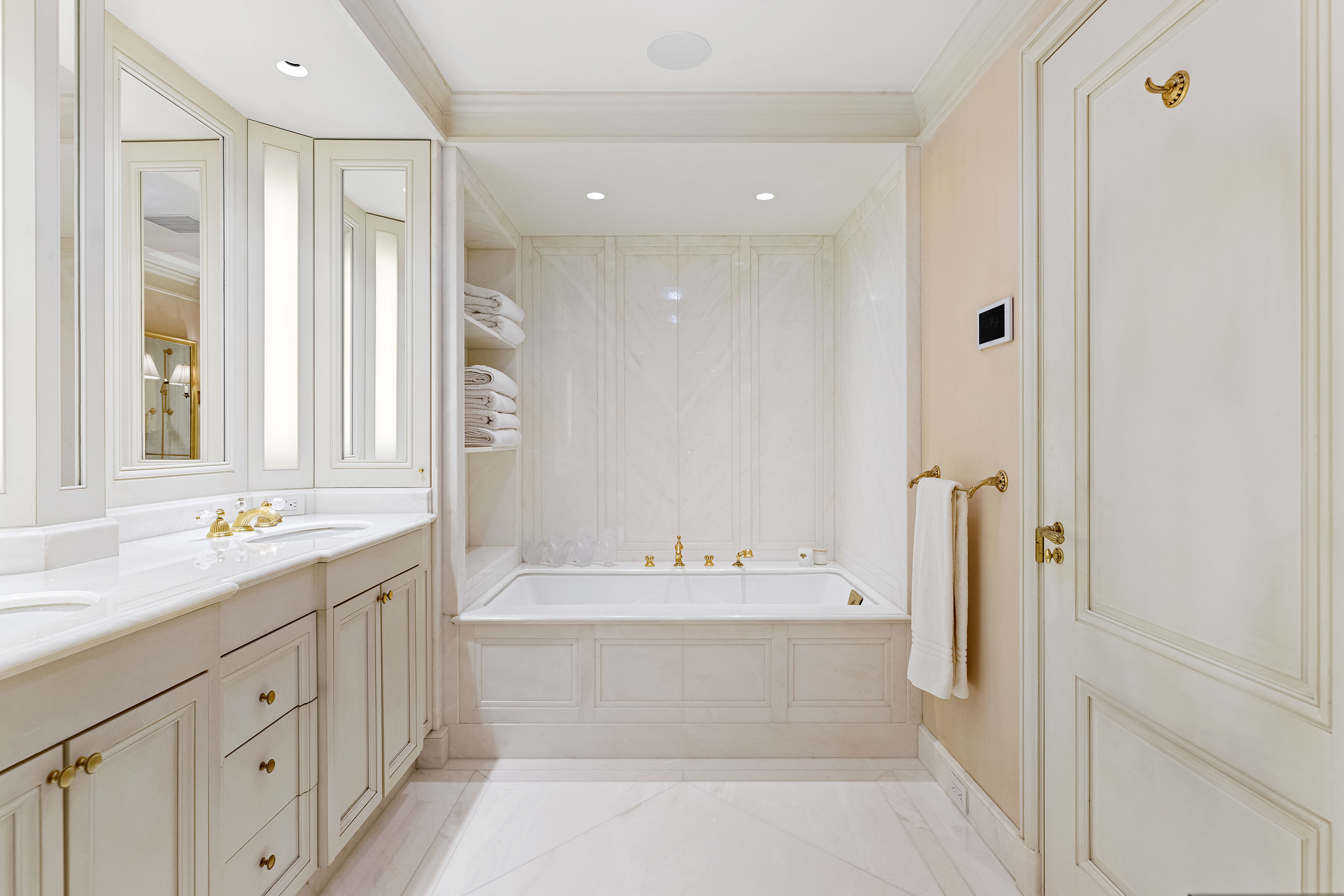 15 West 81st Street, Unit 2D Manhattan, NY 10024 - Photo 18 of 31 a bathroom with a double vanity sink mirror and double