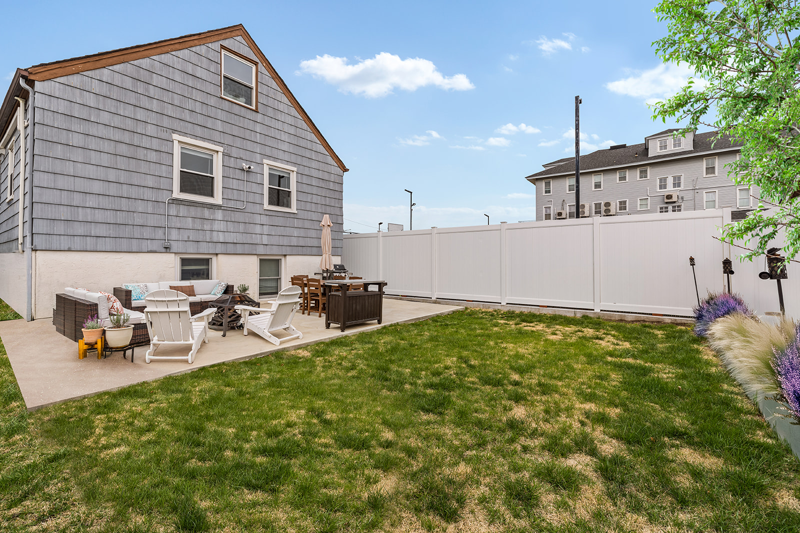 524 Beach 127th Street Queens, NY 11694 - Photo 16 of 18 a view of a house with backyard and sitting area