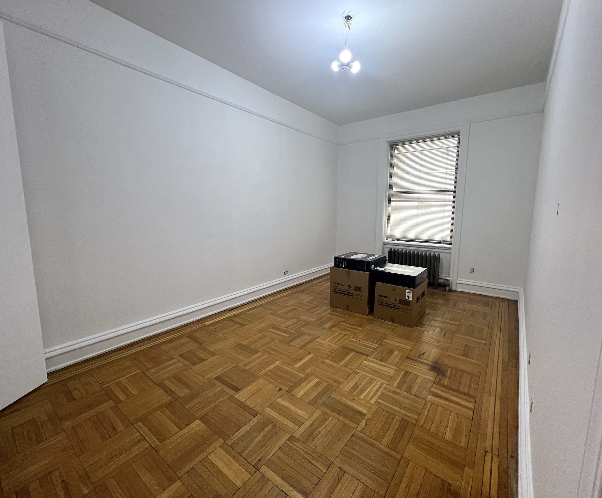 59 Livingston Street, Unit 3A Brooklyn, NY 11201 - Photo 11 of 19 a view of room with window and hardwood floor