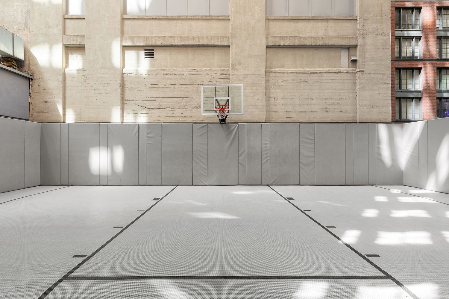 70 Charlton Street, Unit 19D Manhattan, NY 10014 - Photo 9 of 14 a view of parking area of a building