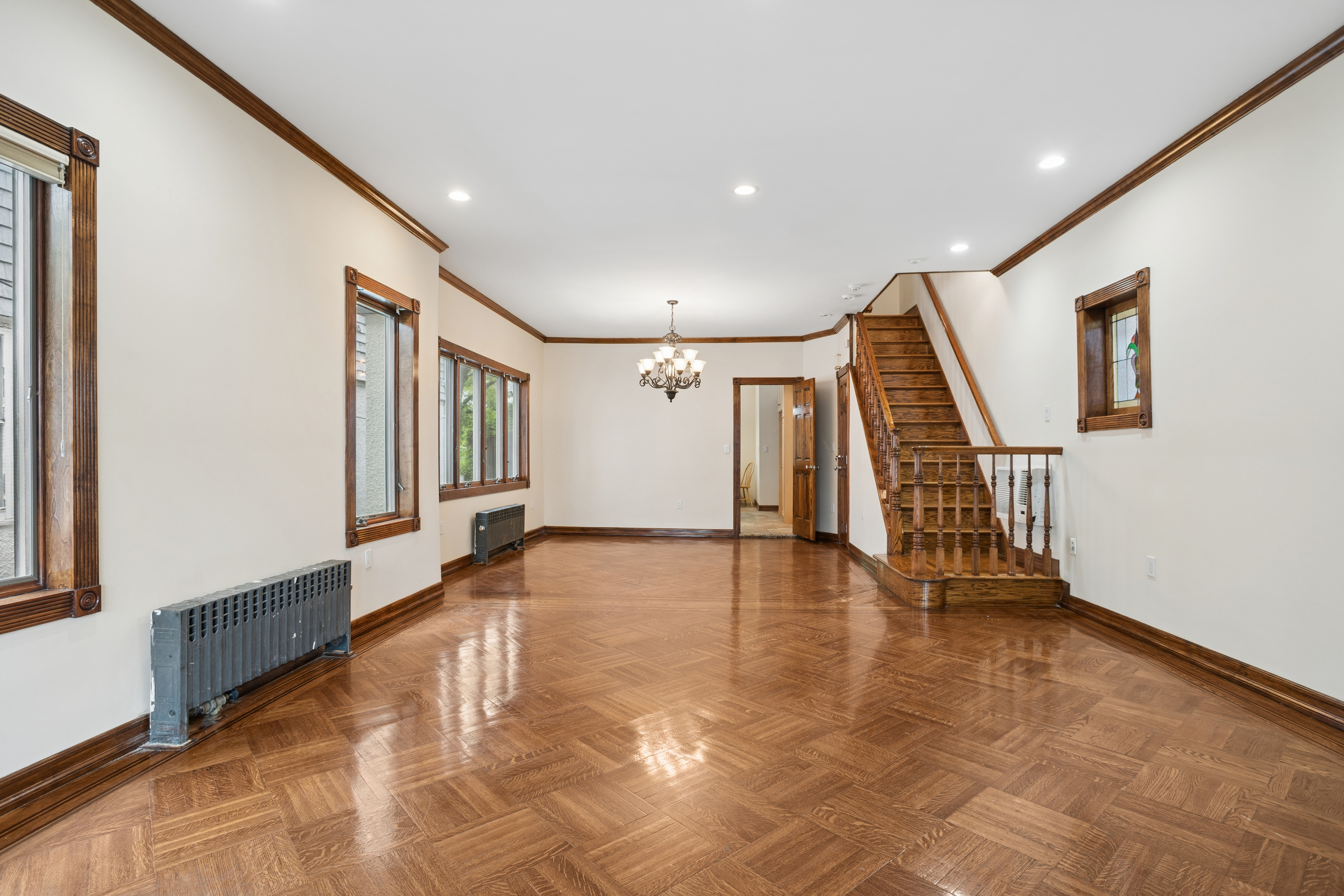 1982 East 23rd Street Brooklyn, NY 11229 - Photo 5 of 16 a view of an entryway with wooden floor