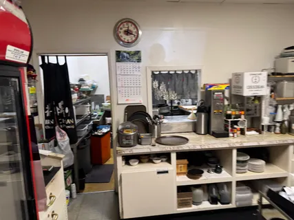 a living room with furniture and flat screen tv