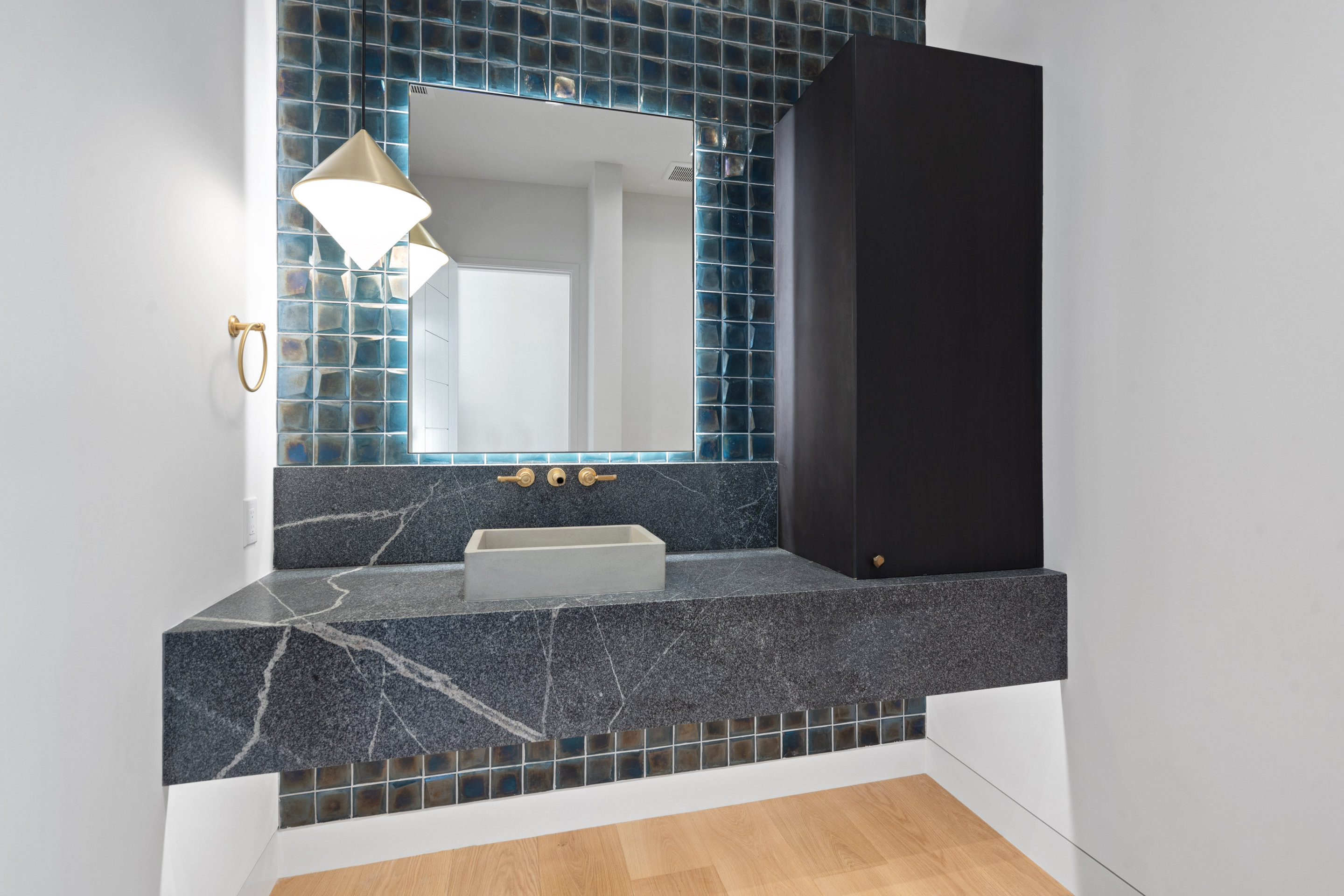 1905 Hallam Drive Austin, TX 78746 - Photo 28 of 39 a bathroom with a bathtub and a sink