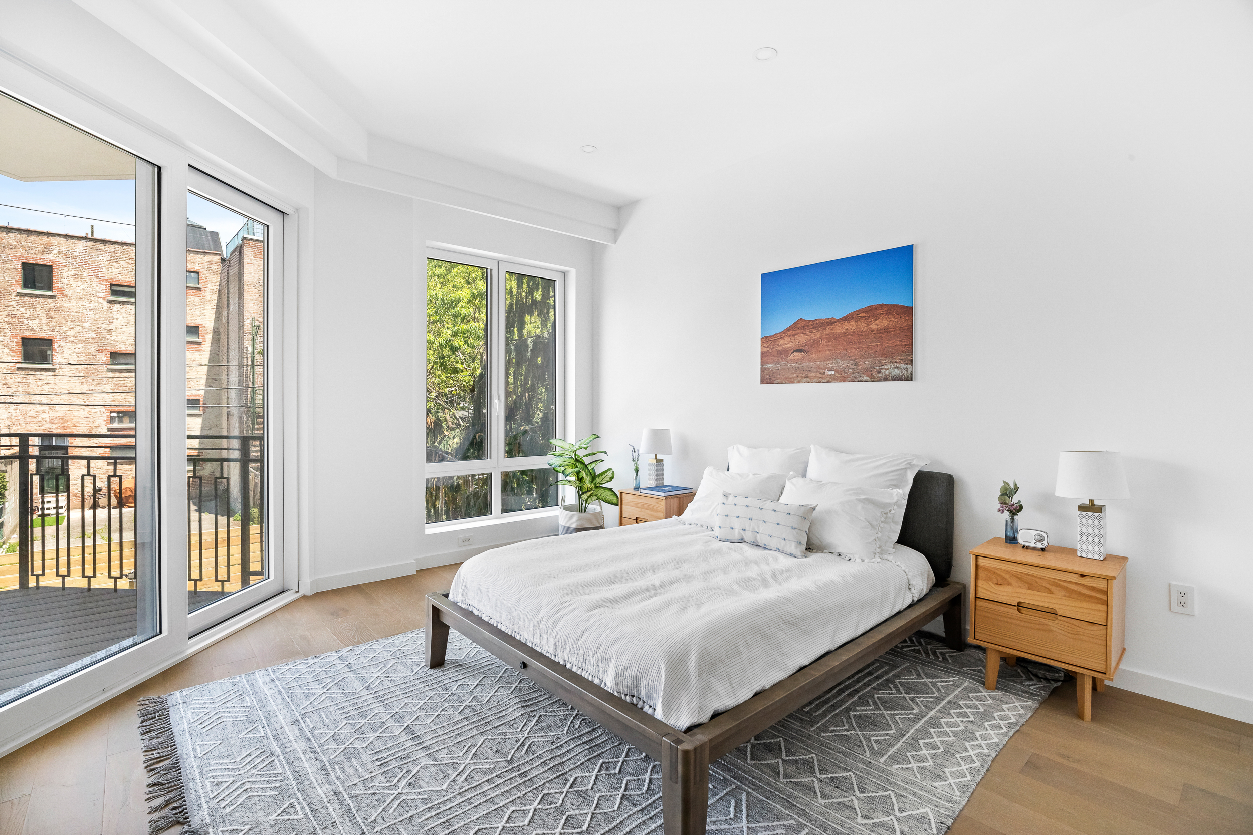 249 18th Street, Unit 3 Brooklyn, NY 11215 - Photo 5 of 14 a bedroom with a bed and wooden floor