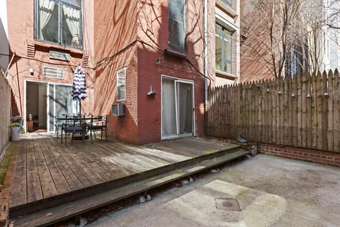 a view of a building with a patio