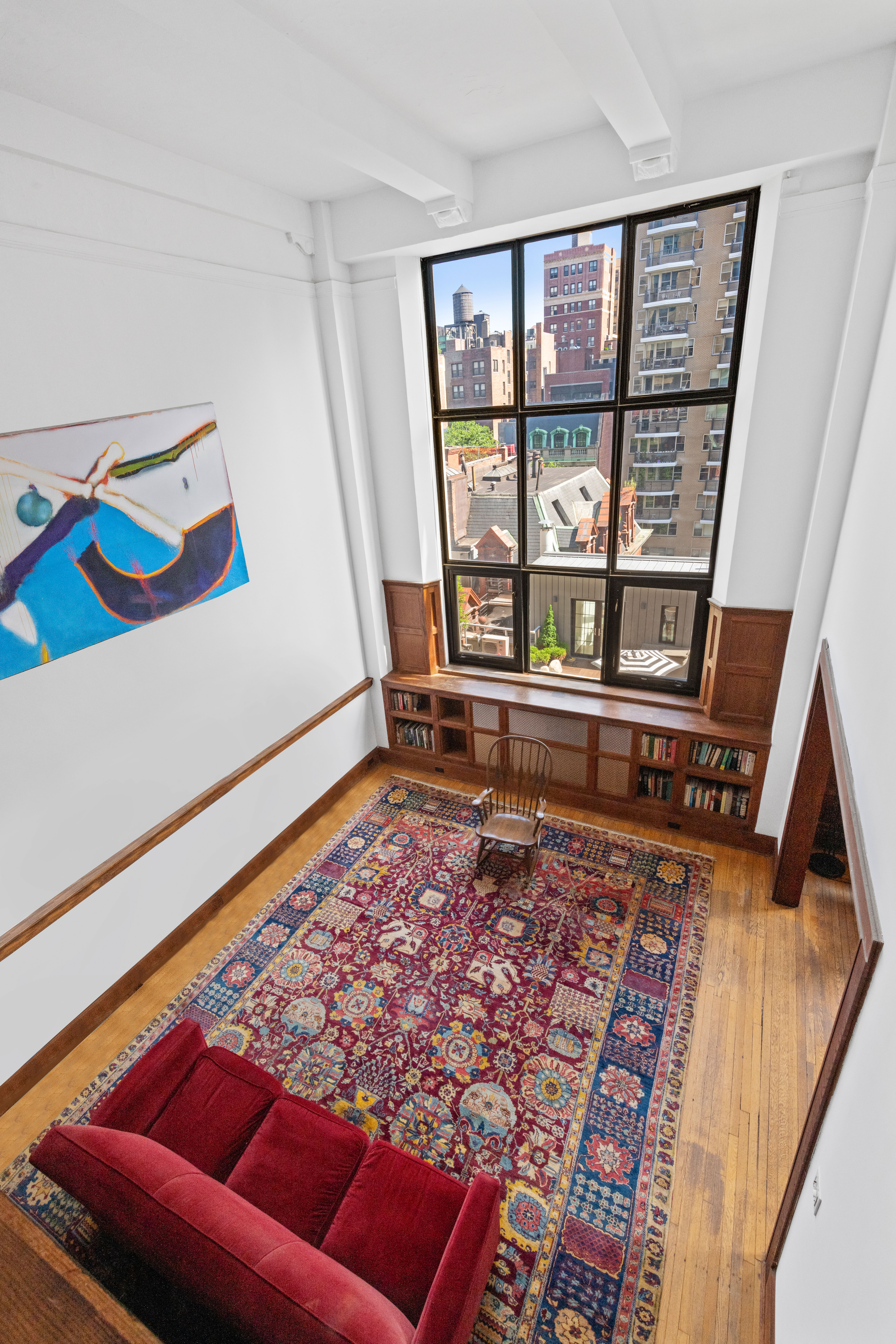 1 West 67th Street, Unit 501/502 Manhattan, NY 10023 - Photo 7 of 19 a room with furniture and a rug