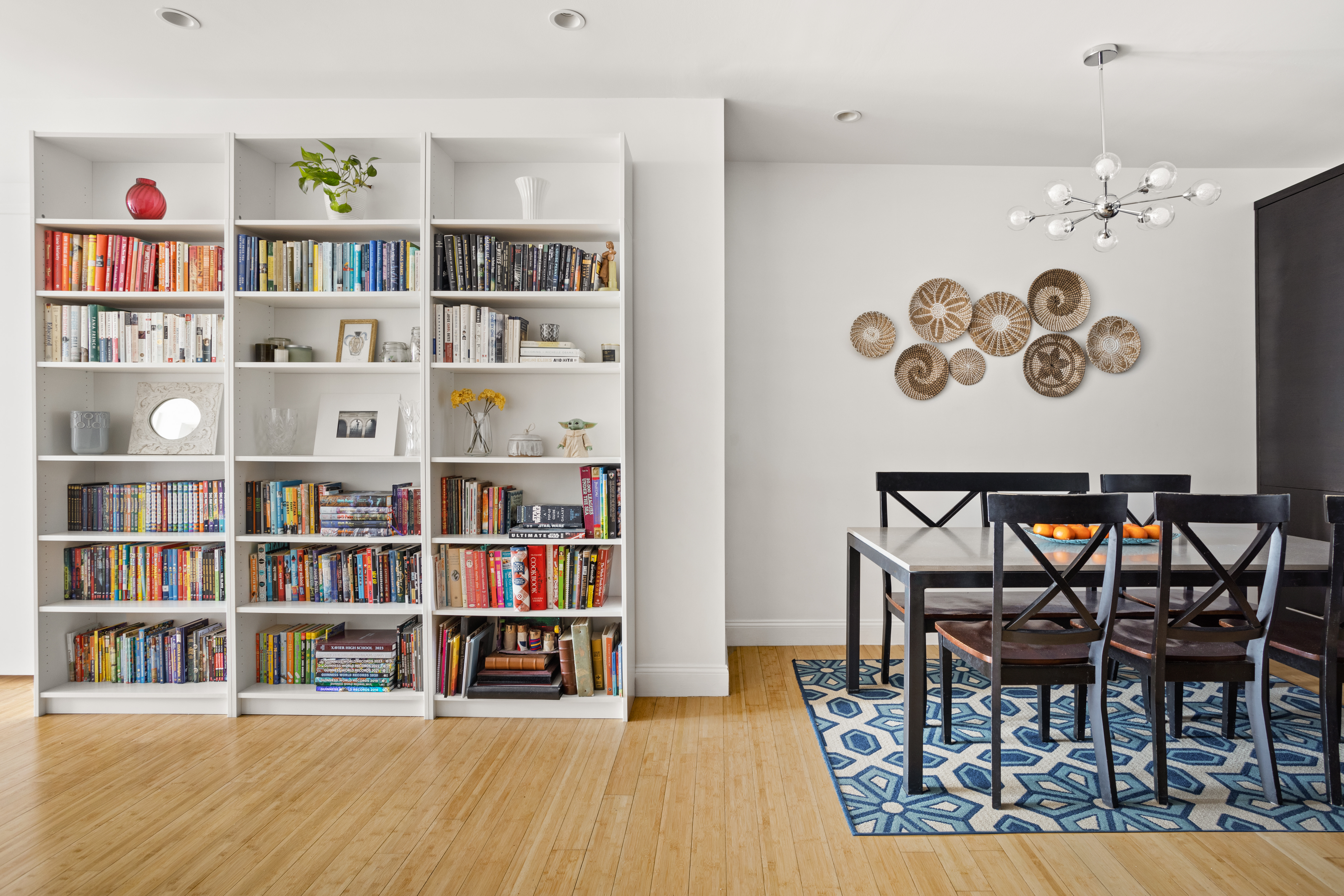 35 McDonald Avenue, Unit 2B Brooklyn, NY 11218 - Photo 3 of 10 a living room with lots of furniture and a book shelf