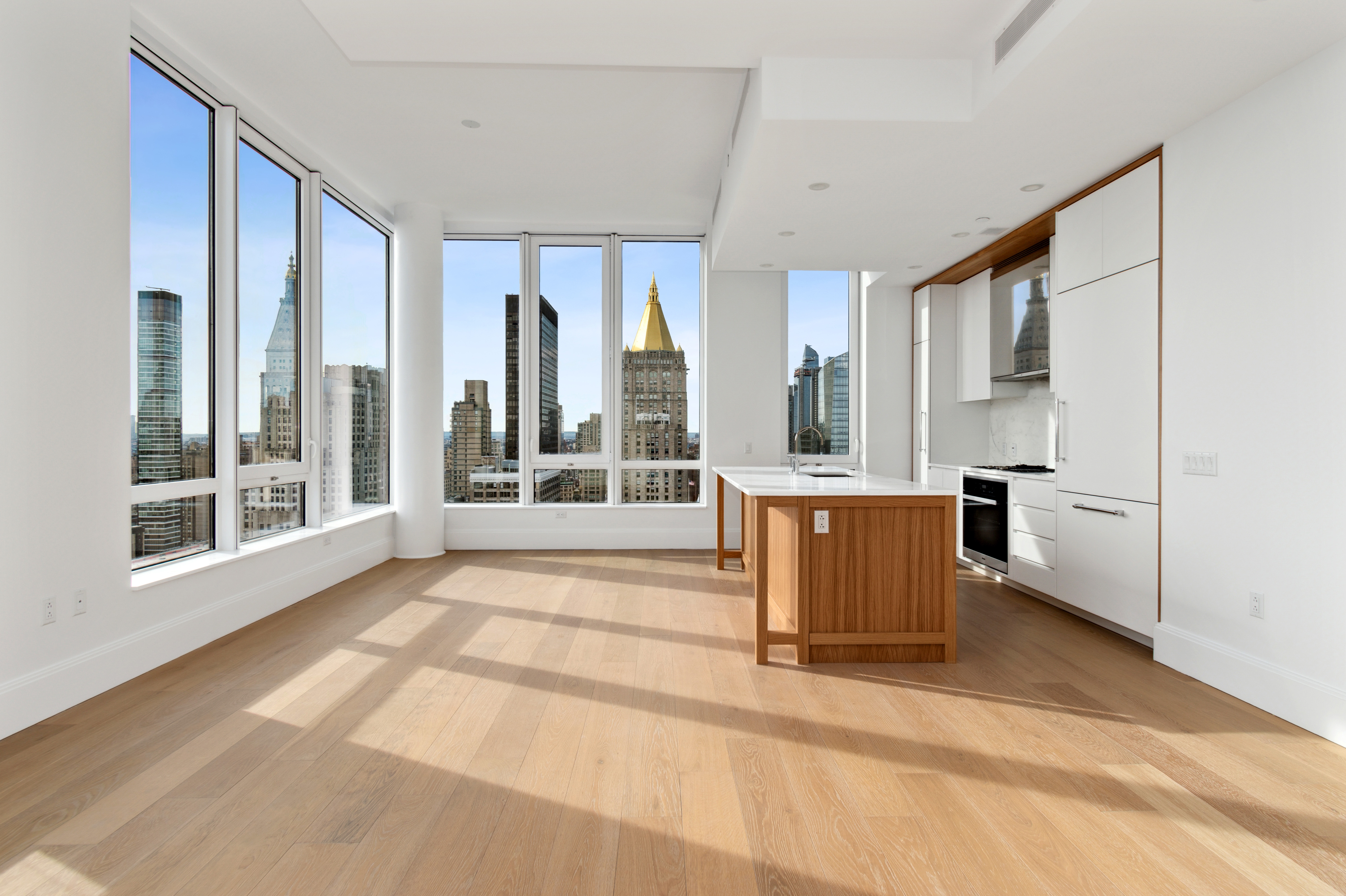 368 3rd Avenue, Unit 32B Manhattan, NY 10016 - Photo 3 of 19 a view of kitchen with stainless steel appliances granite countertop a stove and a refrigerator