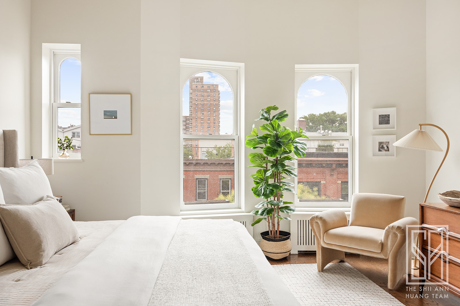 307 7th Street, Unit 4L Brooklyn, NY 11215 - Photo 12 of 15 a bedroom with furniture and a large window