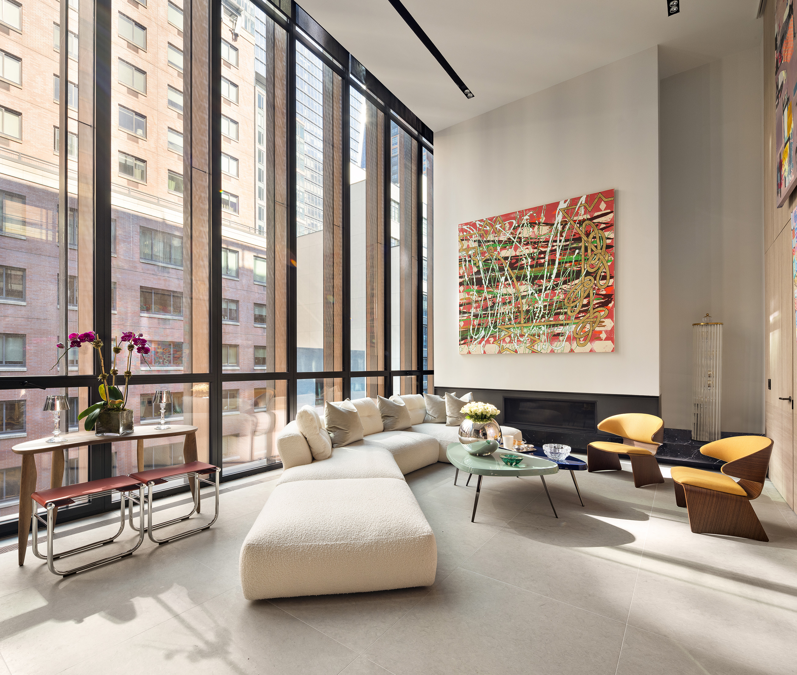 522 West 29th Street, Unit 5D Manhattan, NY 10001 - Photo 2 of 18 a living room with furniture and a large window