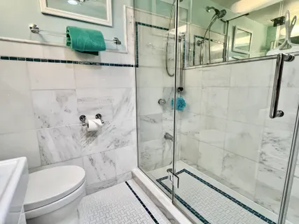 a kitchen with a sink and a refrigerator