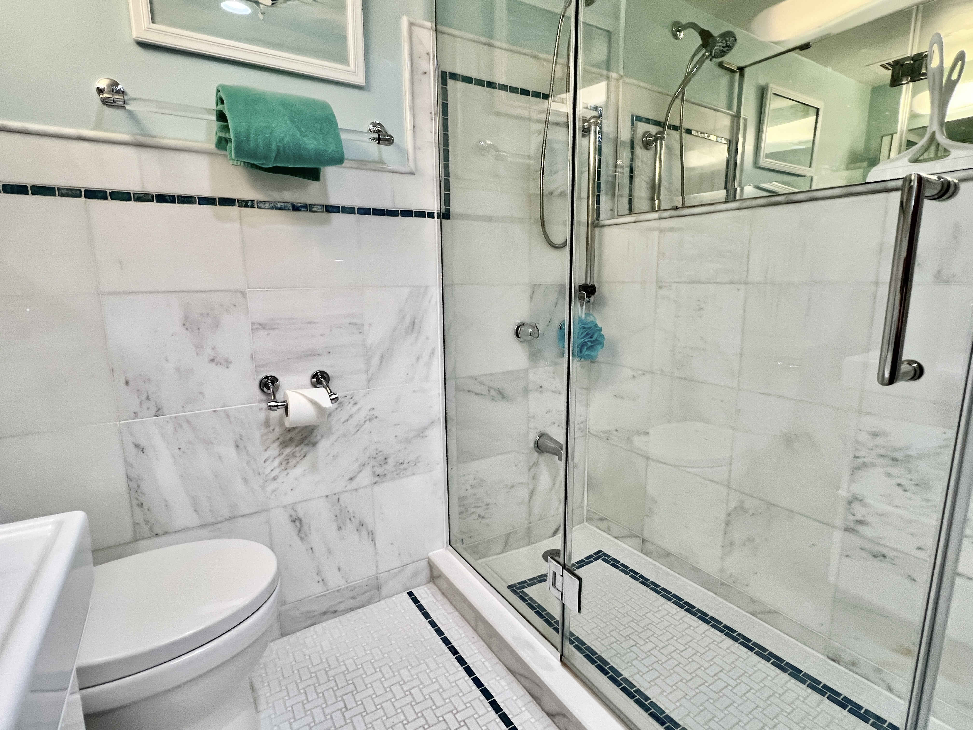 520 N Street Southwest, Unit S112 Washington, DC 20024 - Photo 15 of 40 a bathroom with a granite countertop bathtub shower sink and toilet