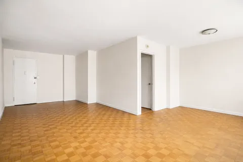 a view of a terrace with furniture and a fire pit
