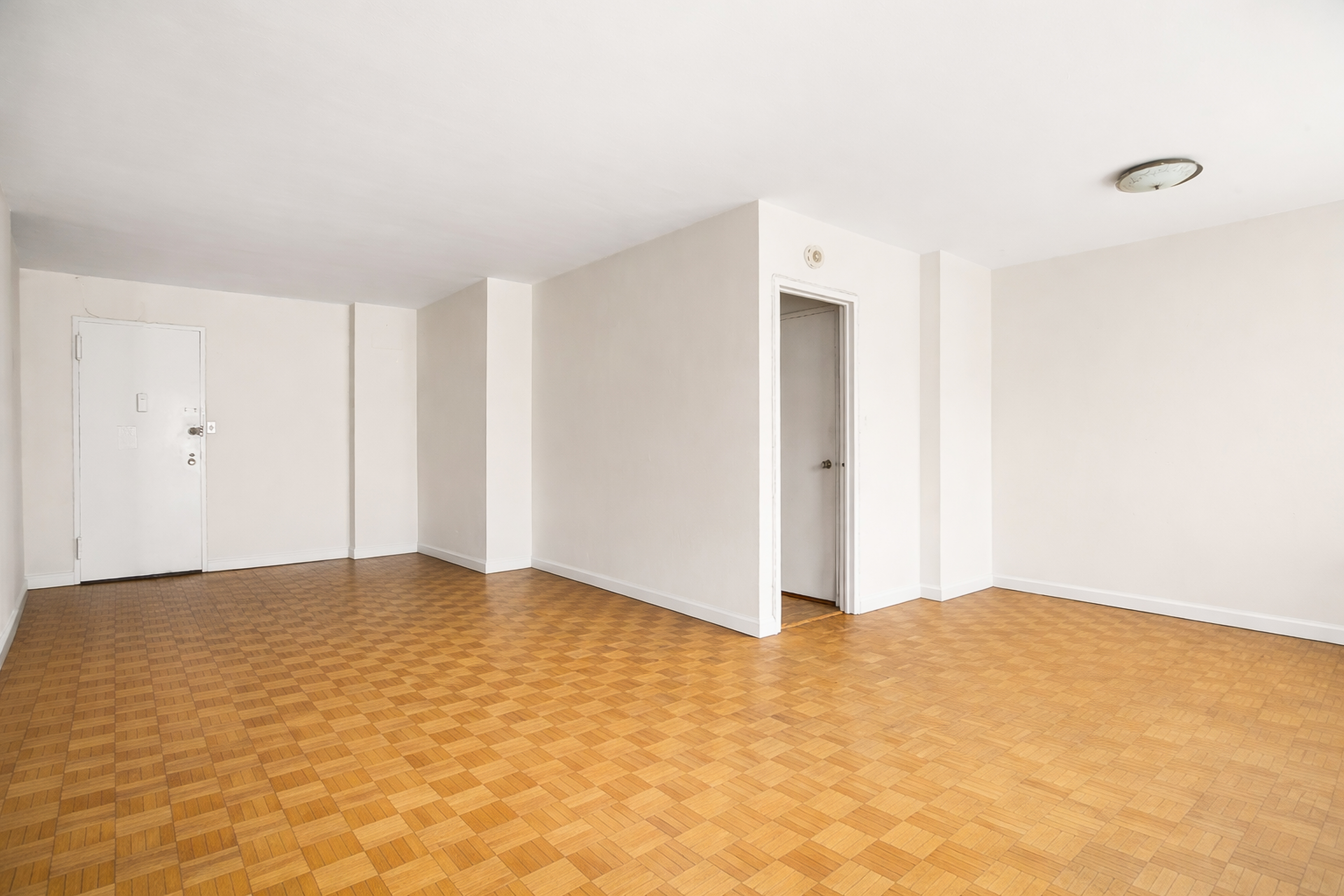 357 East 57th Street, Unit 10C Manhattan, NY 10022 - Photo 5 of 12 a view of an empty room