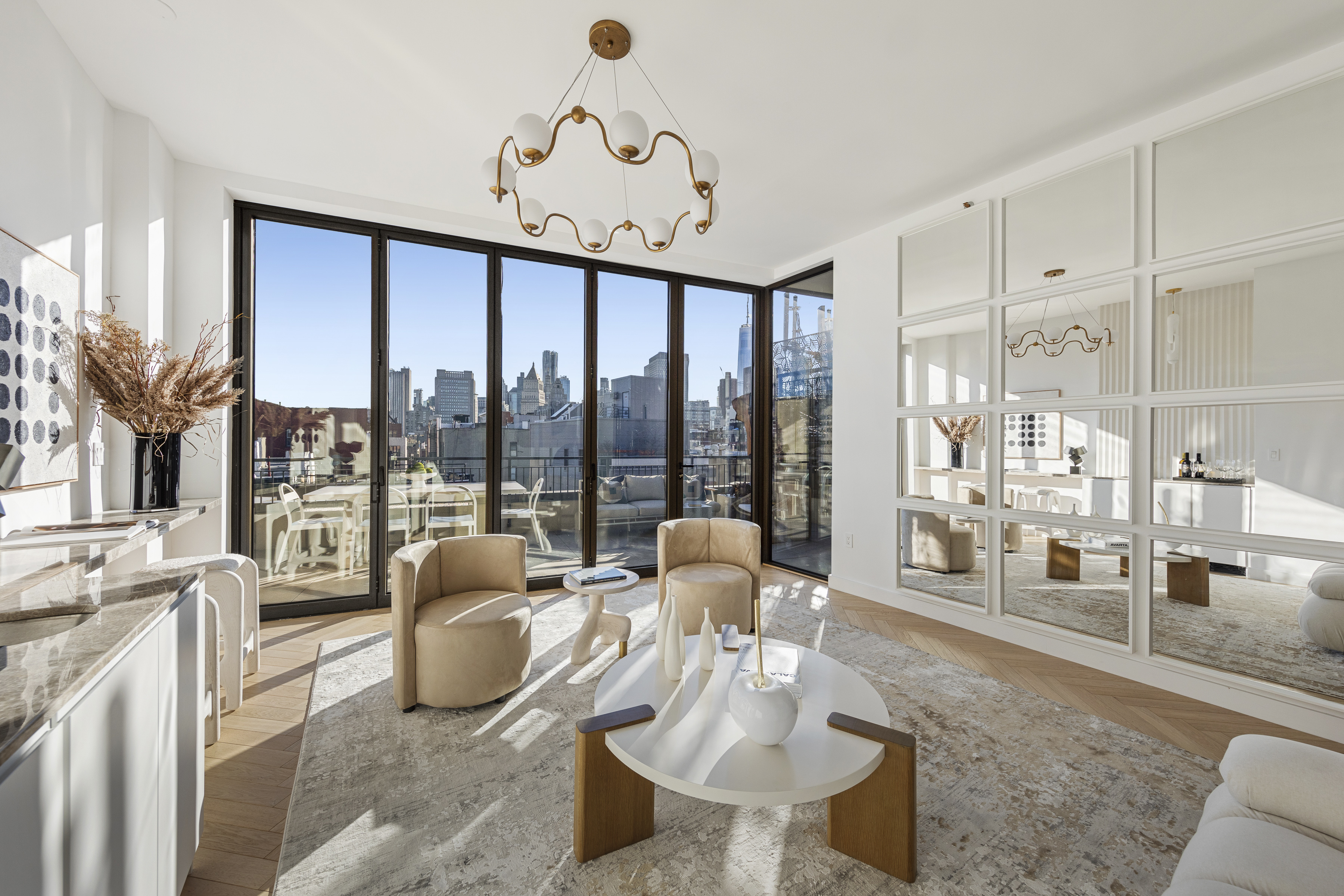 378 Broome Street, Unit PH Manhattan, NY 10013 - Photo 22 of 25 a living room with furniture and a large window