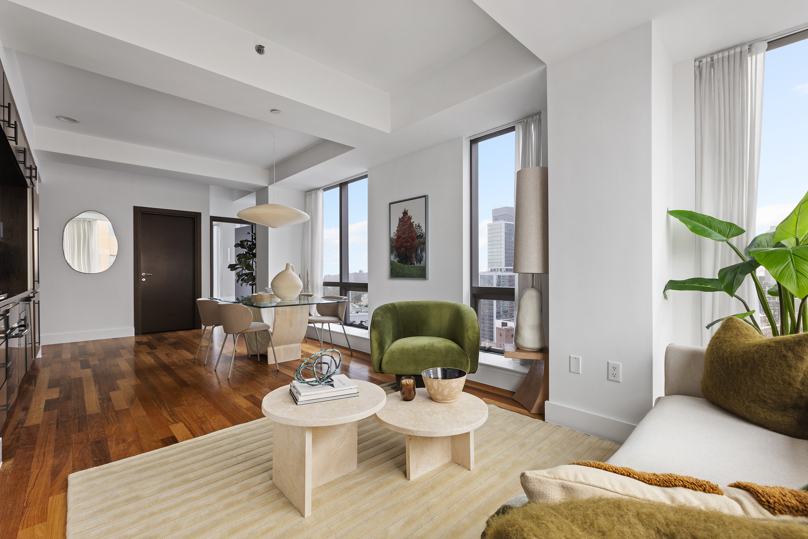 150 Myrtle Avenue, Unit 2506 Brooklyn, NY 11201 - Photo 9 of 16 a living room with furniture and a wooden floor