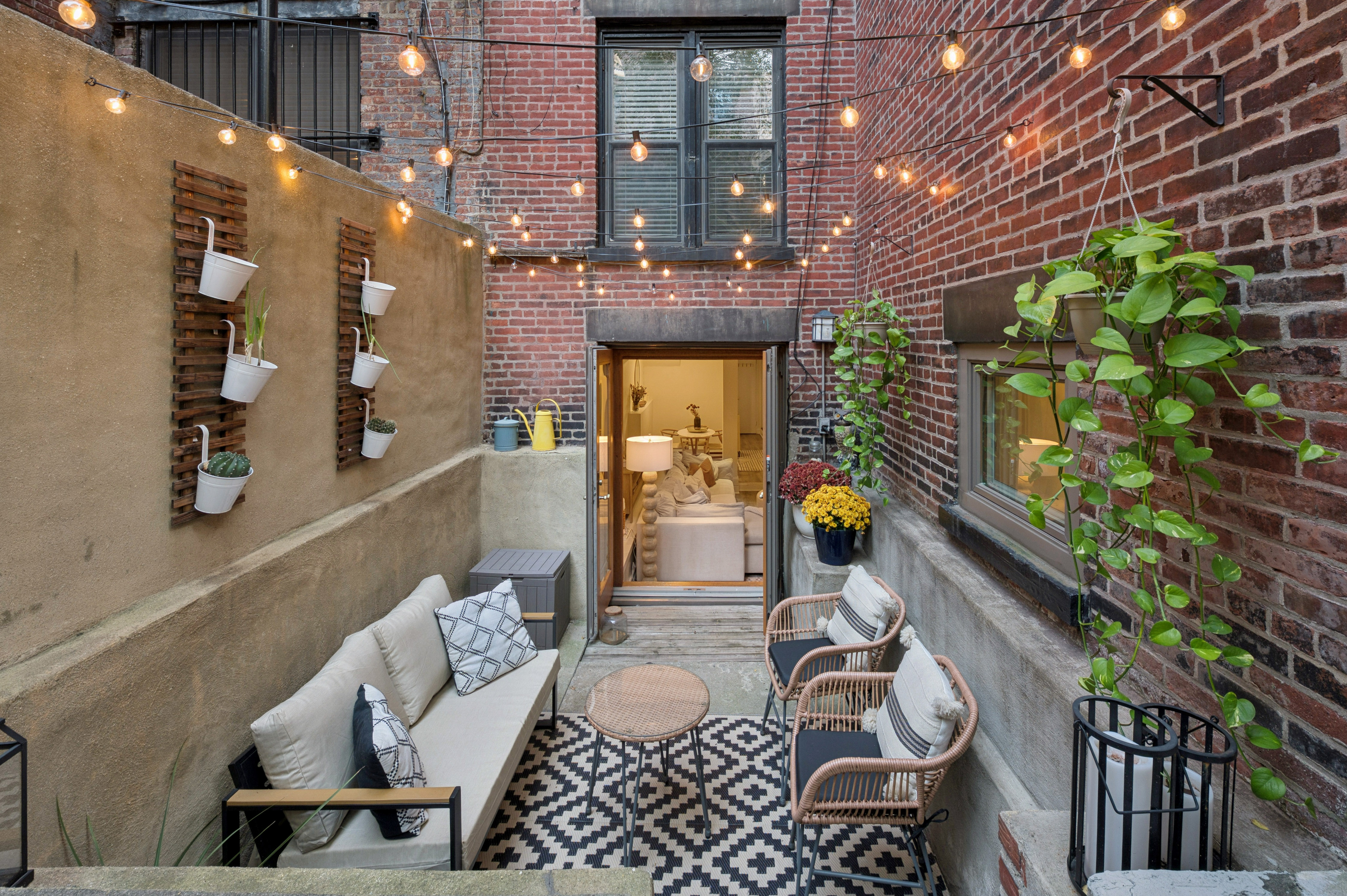 118 West 81st Street, Unit G Manhattan, NY 10024 - Photo 2 of 18 a view of balcony with couch and chairs