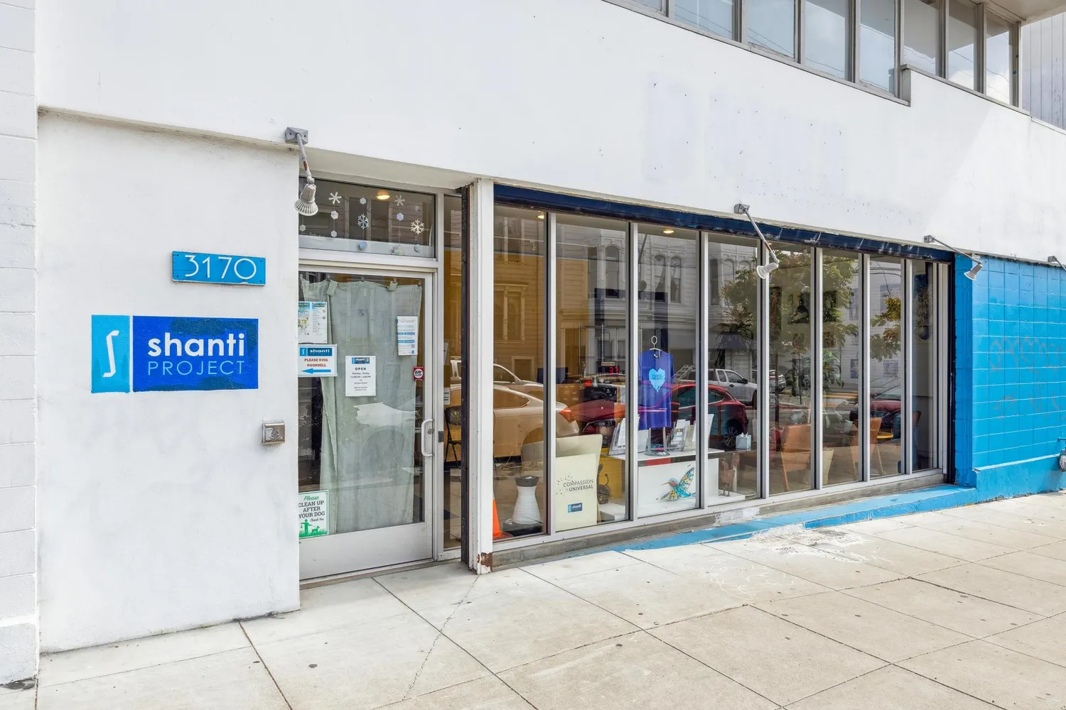 a view of a building with a door and a window
