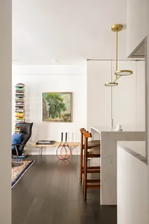 a view of a workspace with furniture