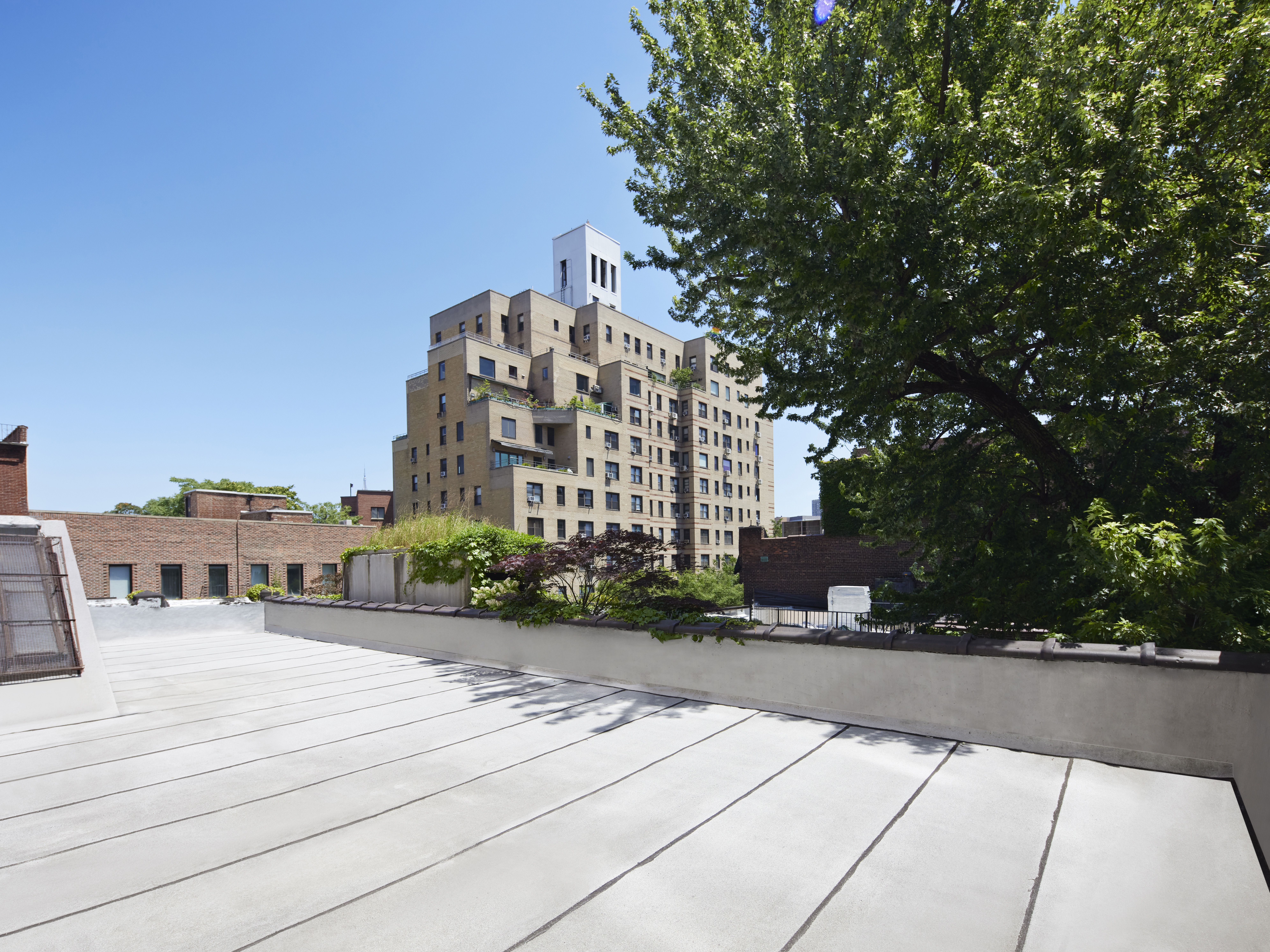 205 West Houston Street Manhattan, NY 10014 - Photo 9 of 10 a view of a building with trees