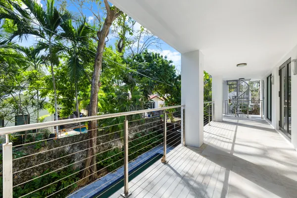 a view of a house with swimming pool