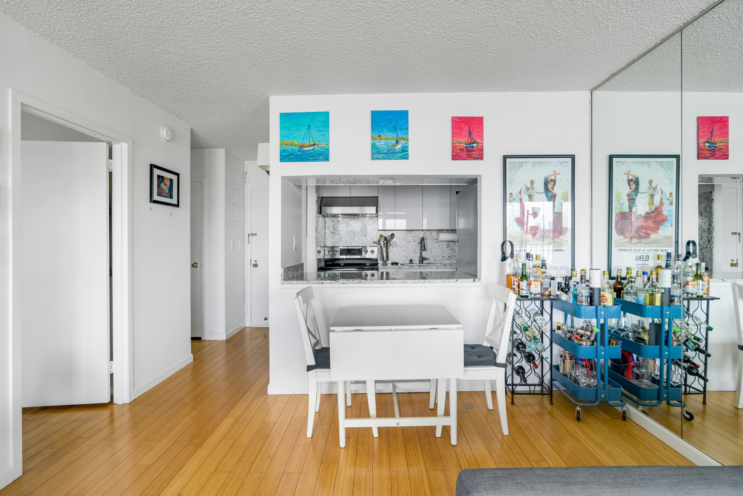 2540 Shore Boulevard, Unit 4S Queens, NY 11102 - Photo 4 of 21 a living room with furniture and a wooden floor