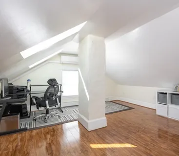 a view of a living room and entryway