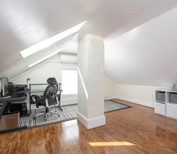 a view of a living room and entryway