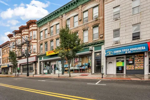 a view of a building and a street