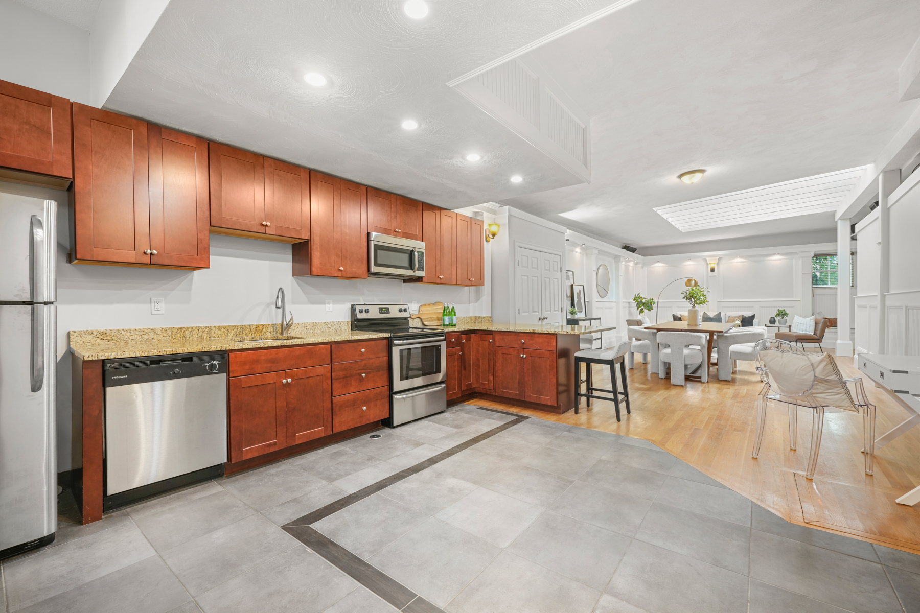 509 Franklin Street, Unit 4 Cambridge, MA 02139 - Photo 10 of 20 a kitchen with stainless steel appliances lots of counter top space cabinets and a sink