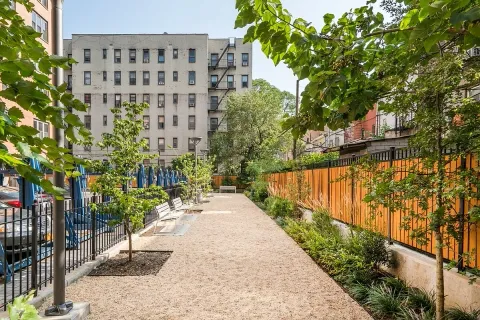 a view of balcony with wooden floor