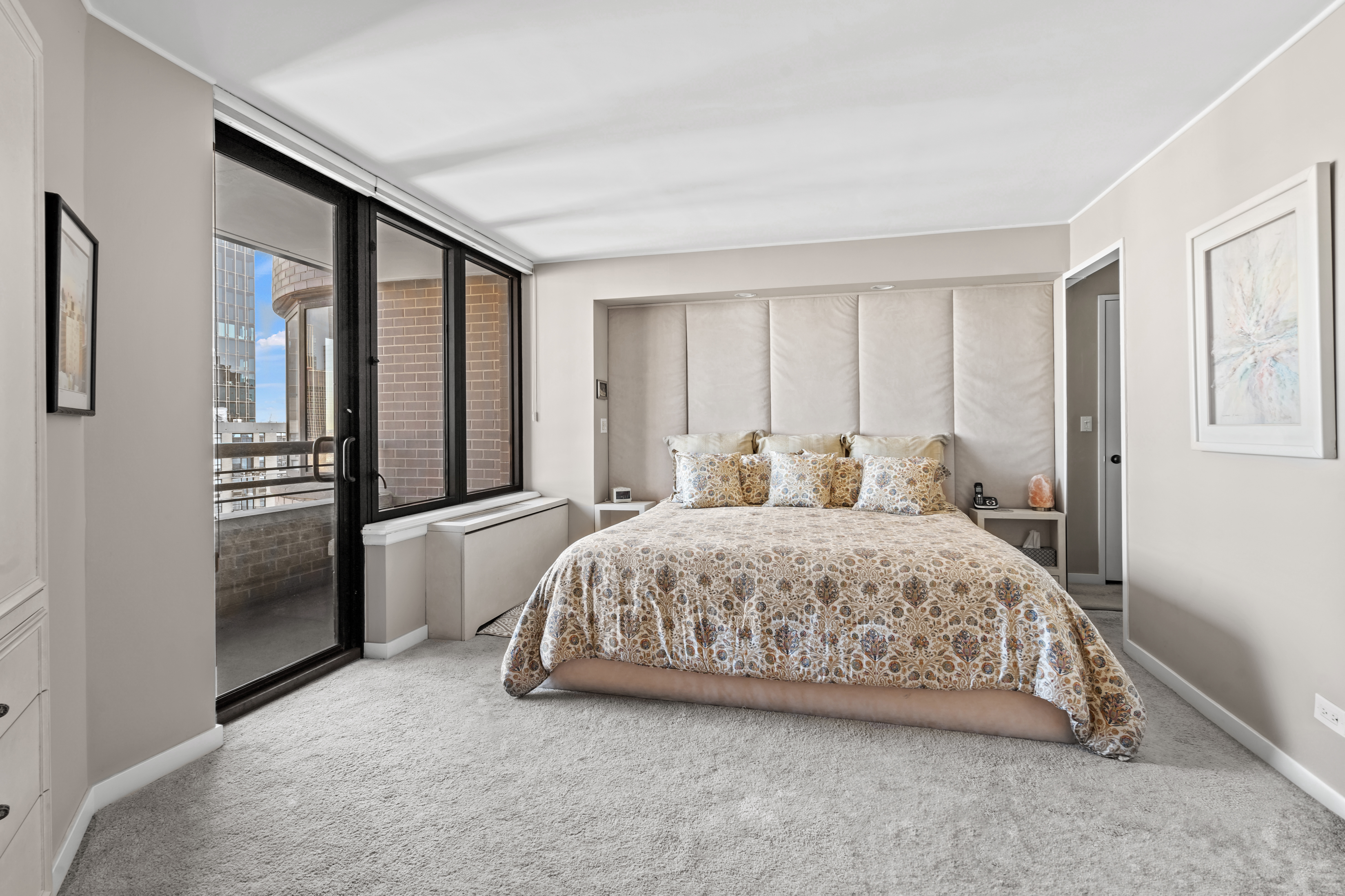 330 East 38th Street, Unit 38E Manhattan, NY 10016 - Photo 16 of 35 a bedroom with a bed and a window