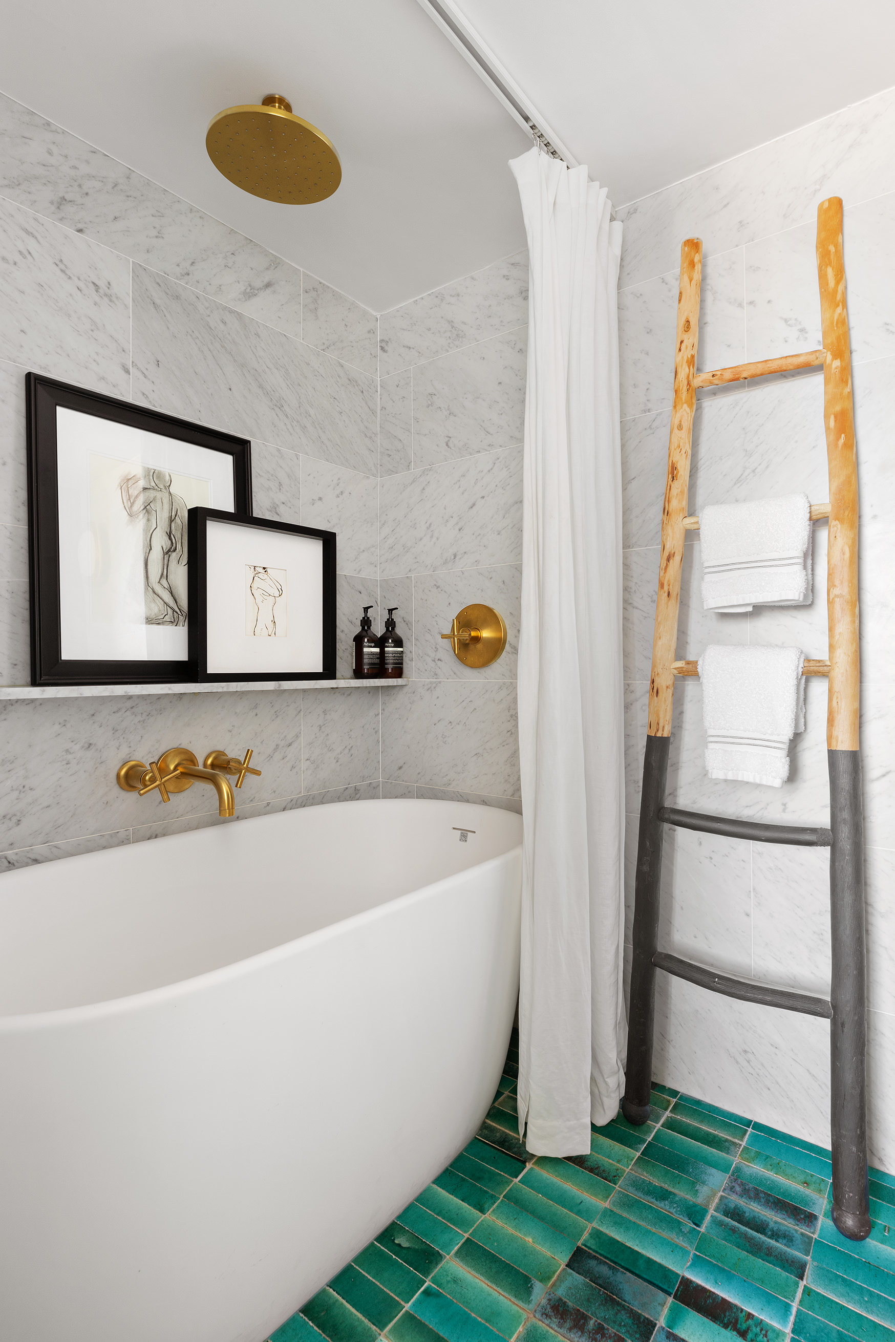 175 East 62nd Street, Unit PHA Manhattan, NY 10065 - Photo 8 of 18 a bathroom with a tub a sink and a window