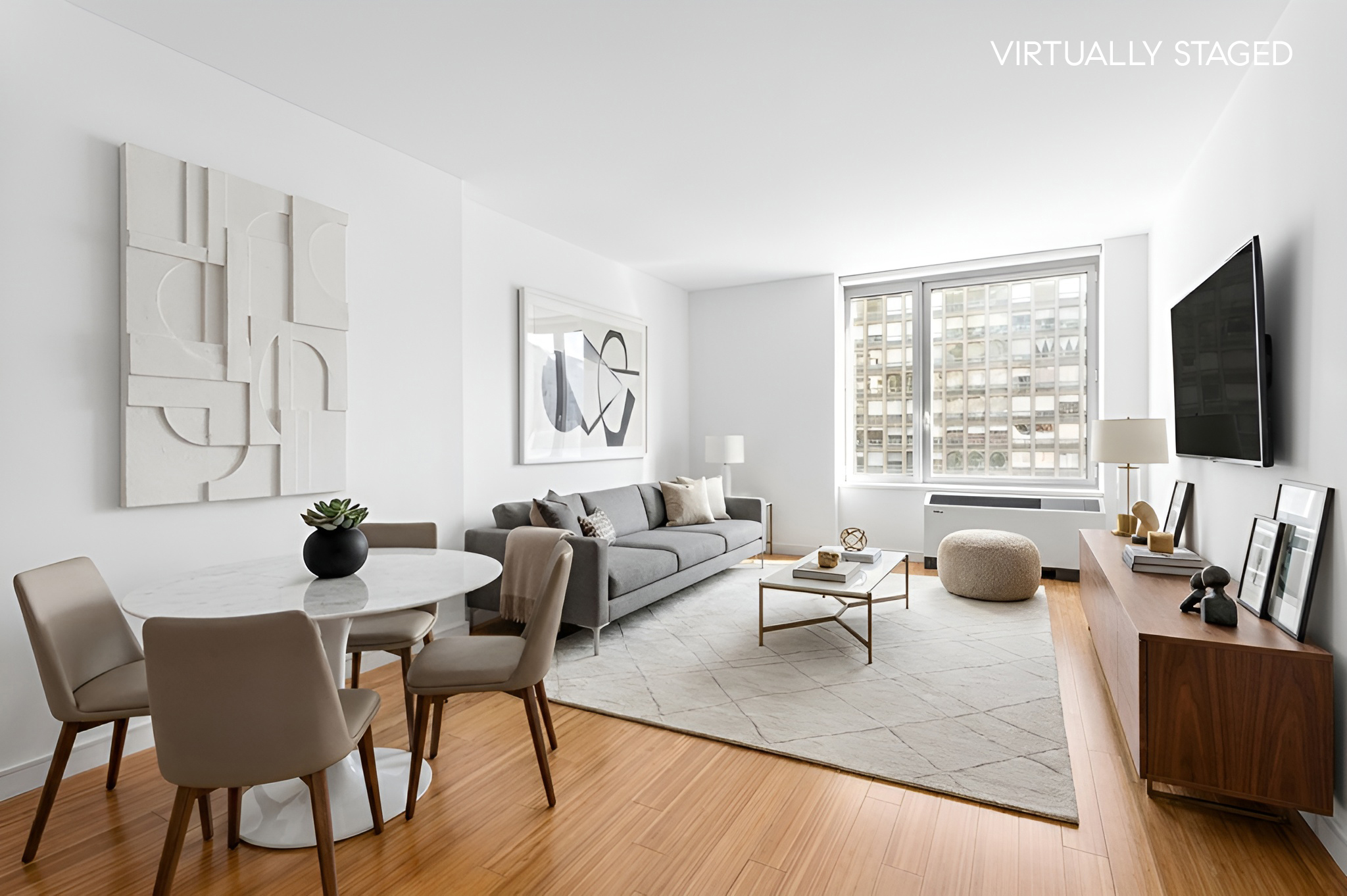 303 East 33rd Street, Unit 5H Manhattan, NY 10016 - Photo 1 of 18 a living room with fireplace furniture and a flat screen tv