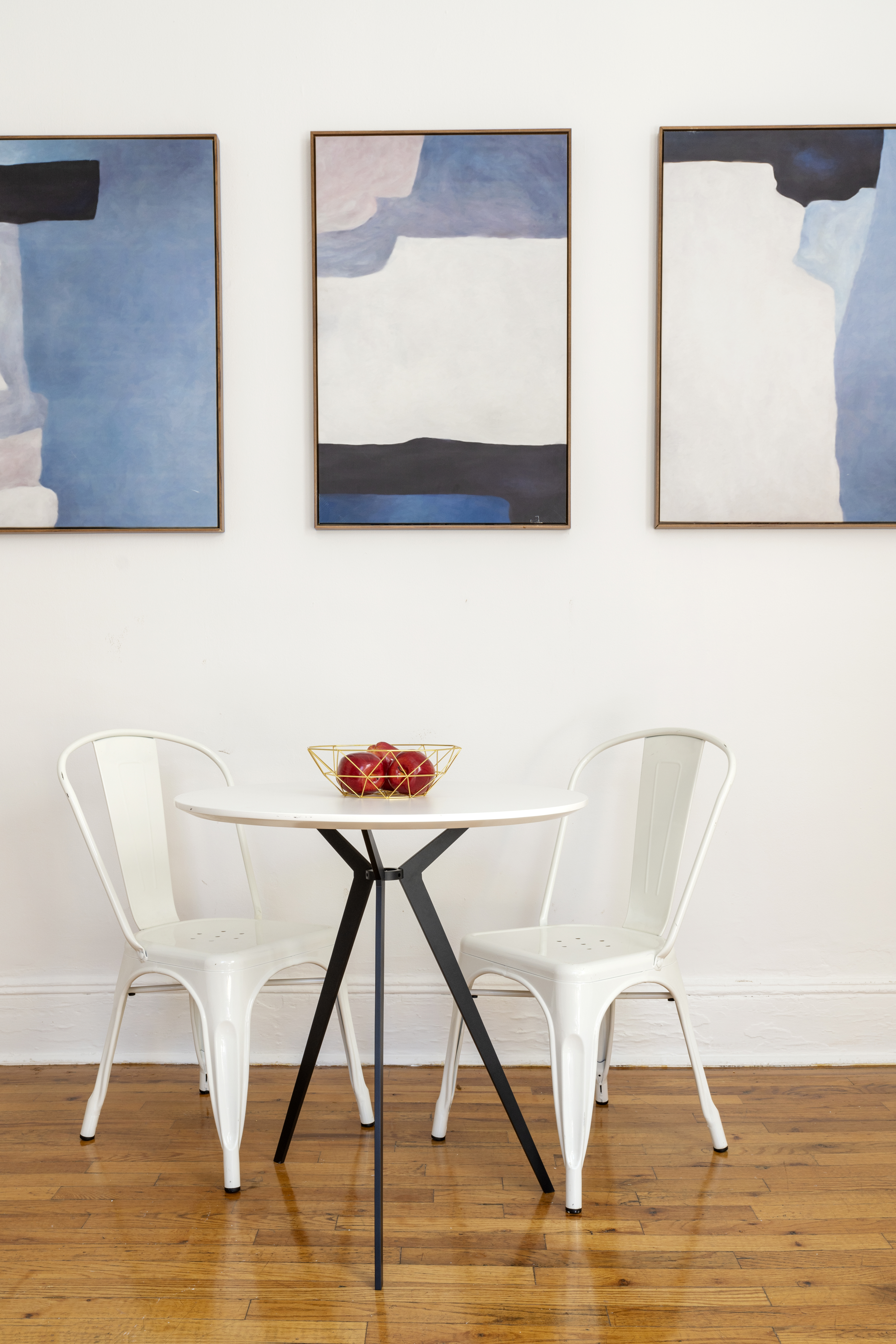 458 West 20th Street, Unit 3D Manhattan, NY 10011 - Photo 4 of 9 a view of a dining room with furniture and wooden floor