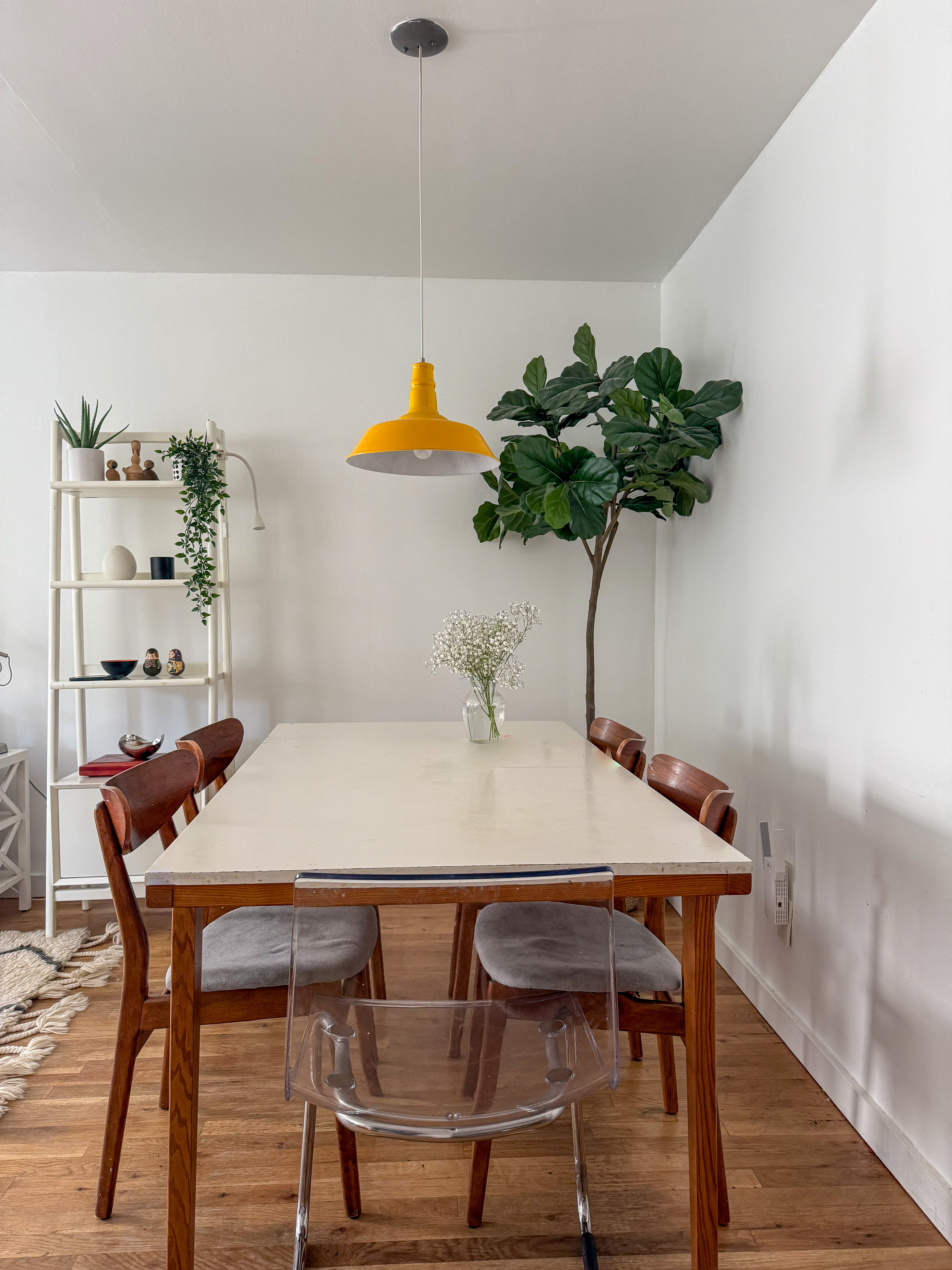 65 South 4th Street, Unit 2 Brooklyn, NY 11249 - Photo 2 of 12 a table with a vase and flowers on it