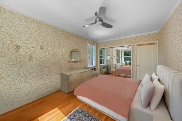 a bed room with a bed and furniture