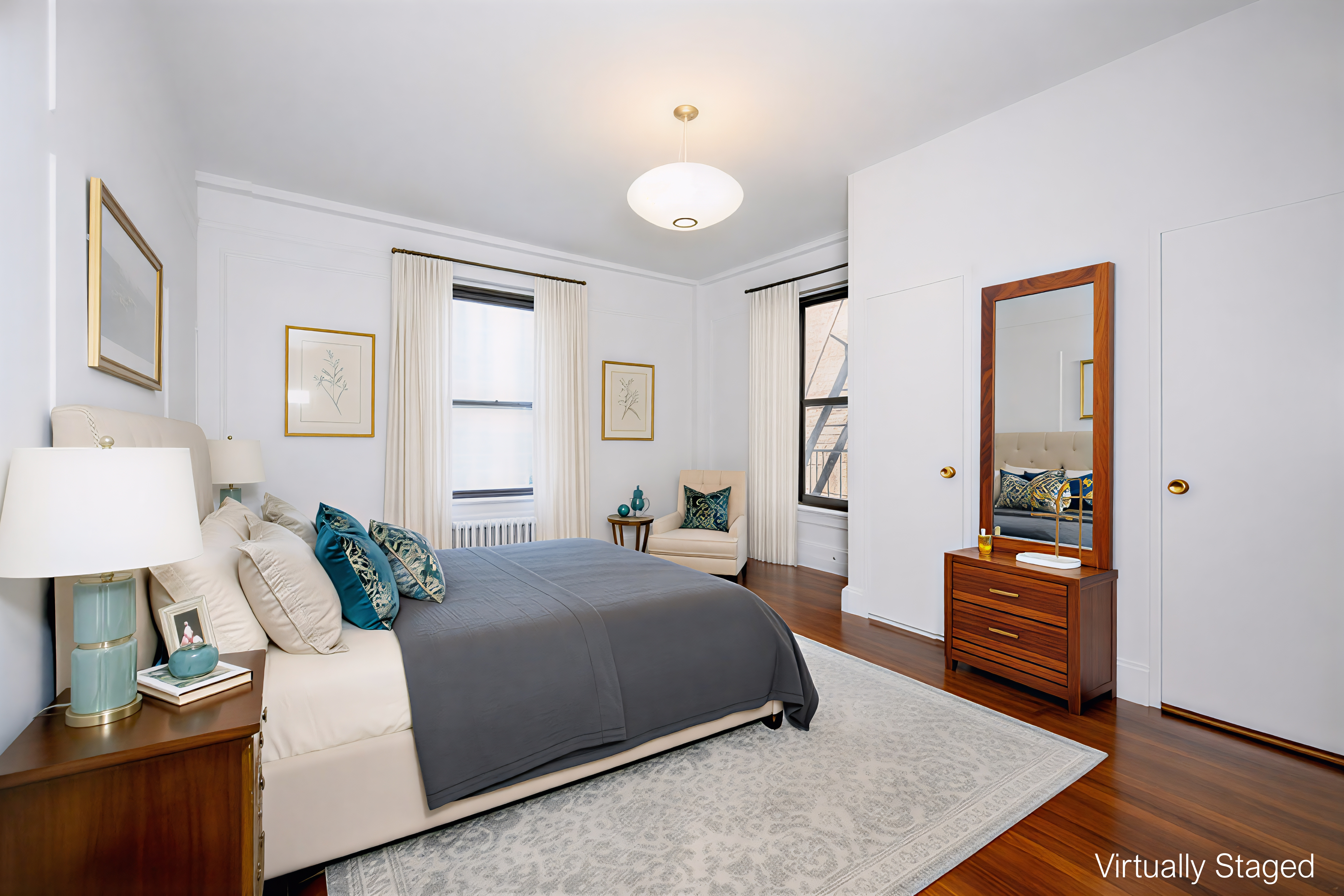 299 Riverside Drive, Unit 4D Manhattan, NY 10025 - Photo 8 of 15 a bedroom with a bed and wooden floor