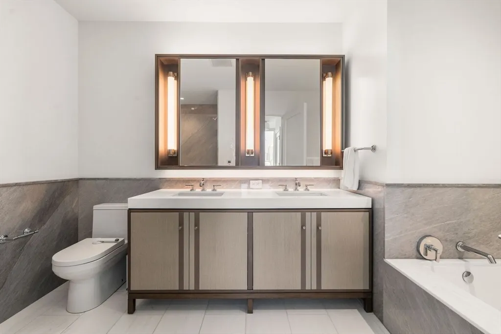 a bathroom with a sink and a toilet