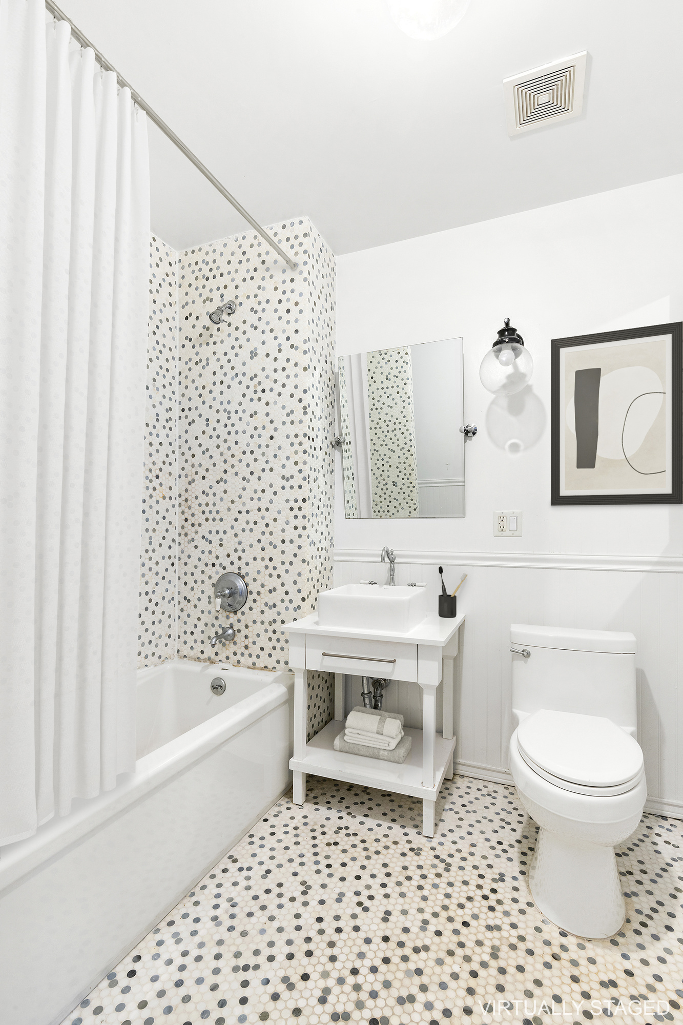 180 Bainbridge Street, Unit 111 Brooklyn, NY 11233 - Photo 4 of 25 a bathroom with a toilet a sink and a bathtub