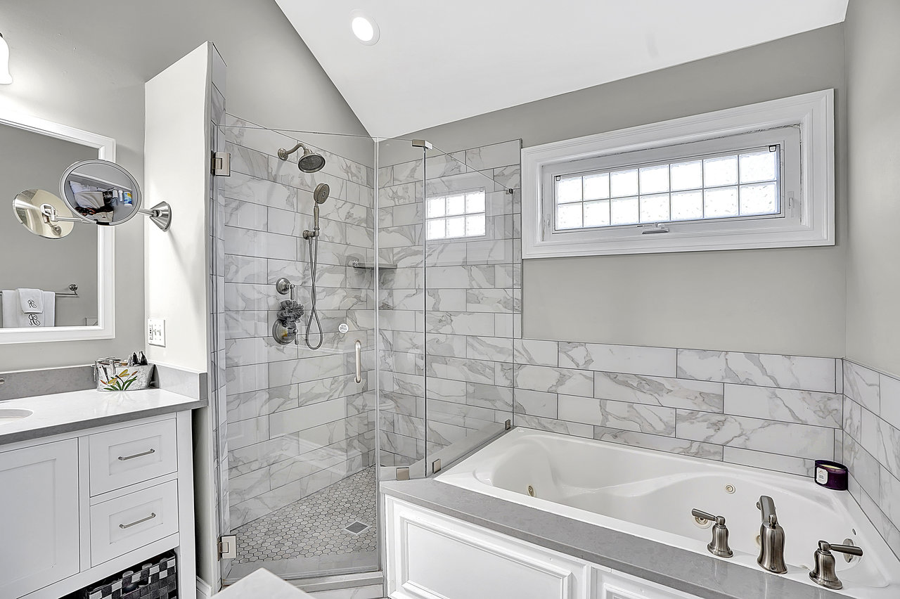 266 Feronia Way Rutherford, NJ 07070 - Photo 22 of 41 a bathroom with a bathtub sink and shower