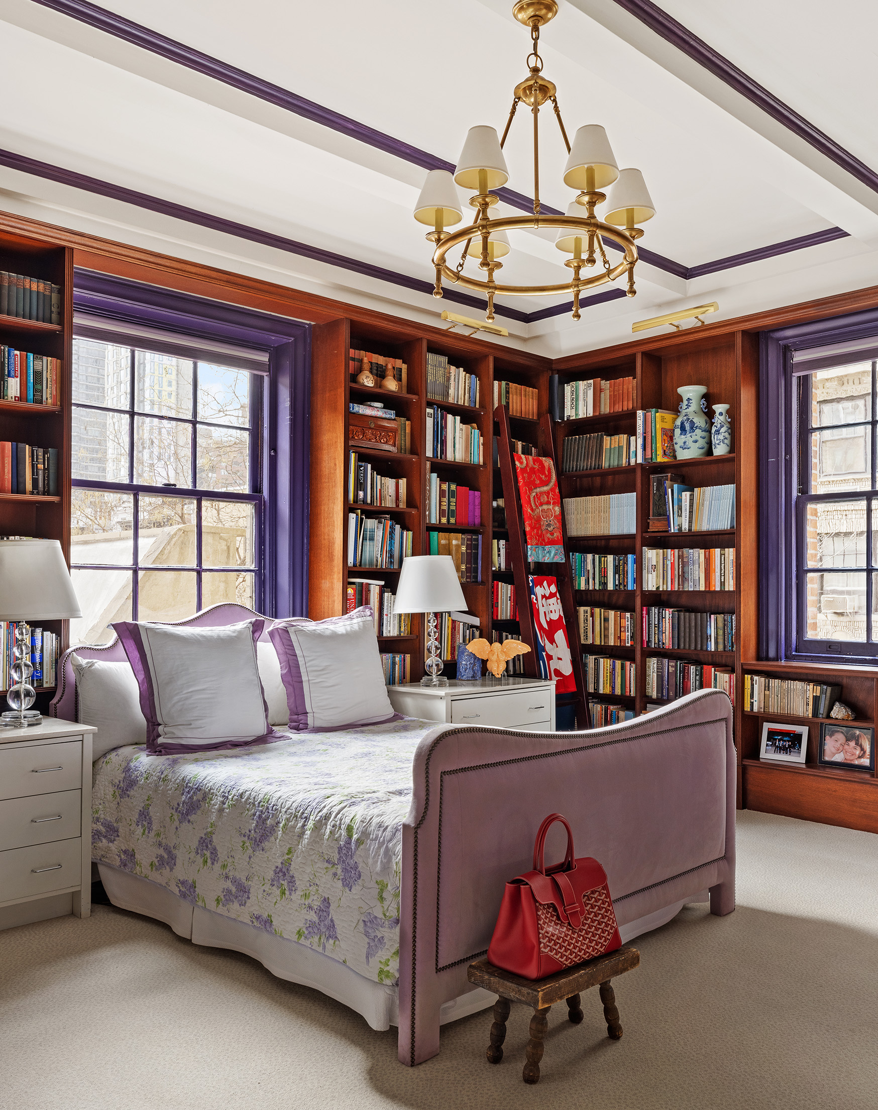 563 Park Avenue, Unit 4E Manhattan, NY 10065 - Photo 6 of 17 a living room with furniture a window and a chandelier